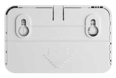 Tył białego czujnika tlenku węgla z otworami montażowymi.