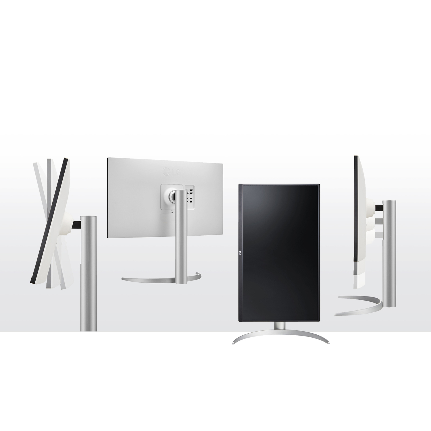 Multiple views of silver computer monitors with black screens and a curved silver stand on a white background.