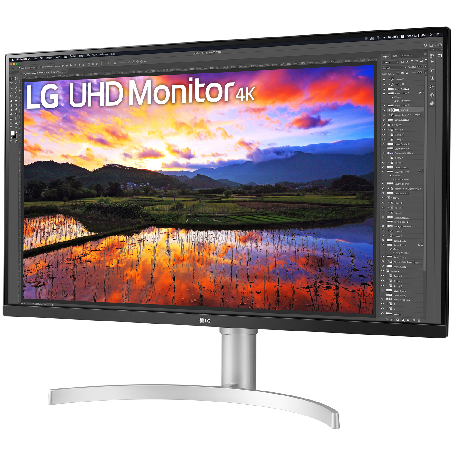 Le moniteur LG 4K UHD affiche un paysage avec un coucher de soleil. Interface logicielle à droite.
