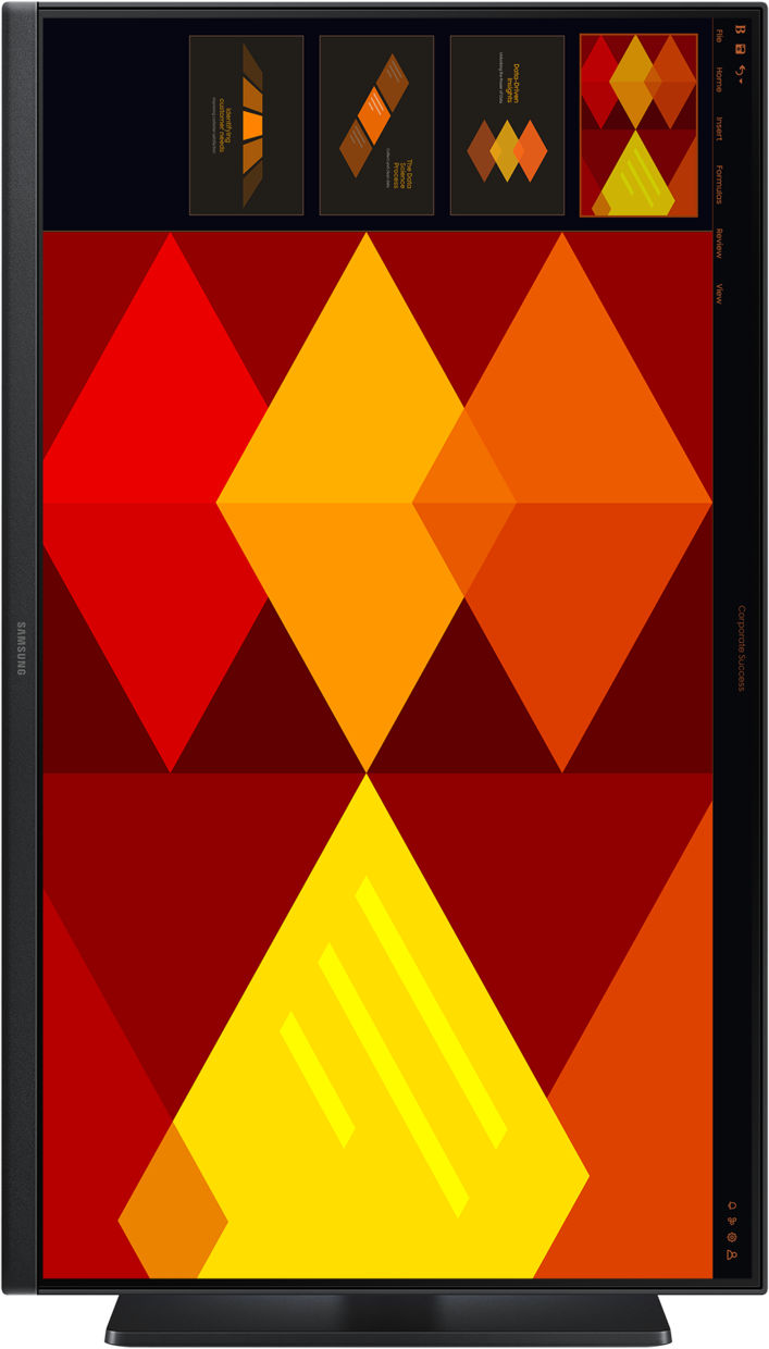Un moniteur Samsung affiche une présentation abstraite et colorée de formes de diamant en rouge, orange et jaune.