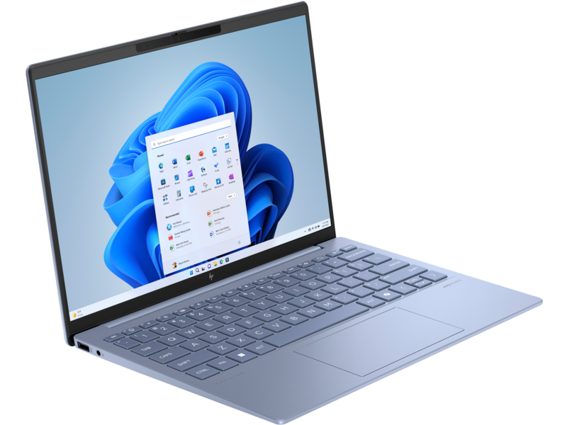 Laptop, nyitott, Windows 11 képernyő. A laptop kék színű és világos háttéren van.