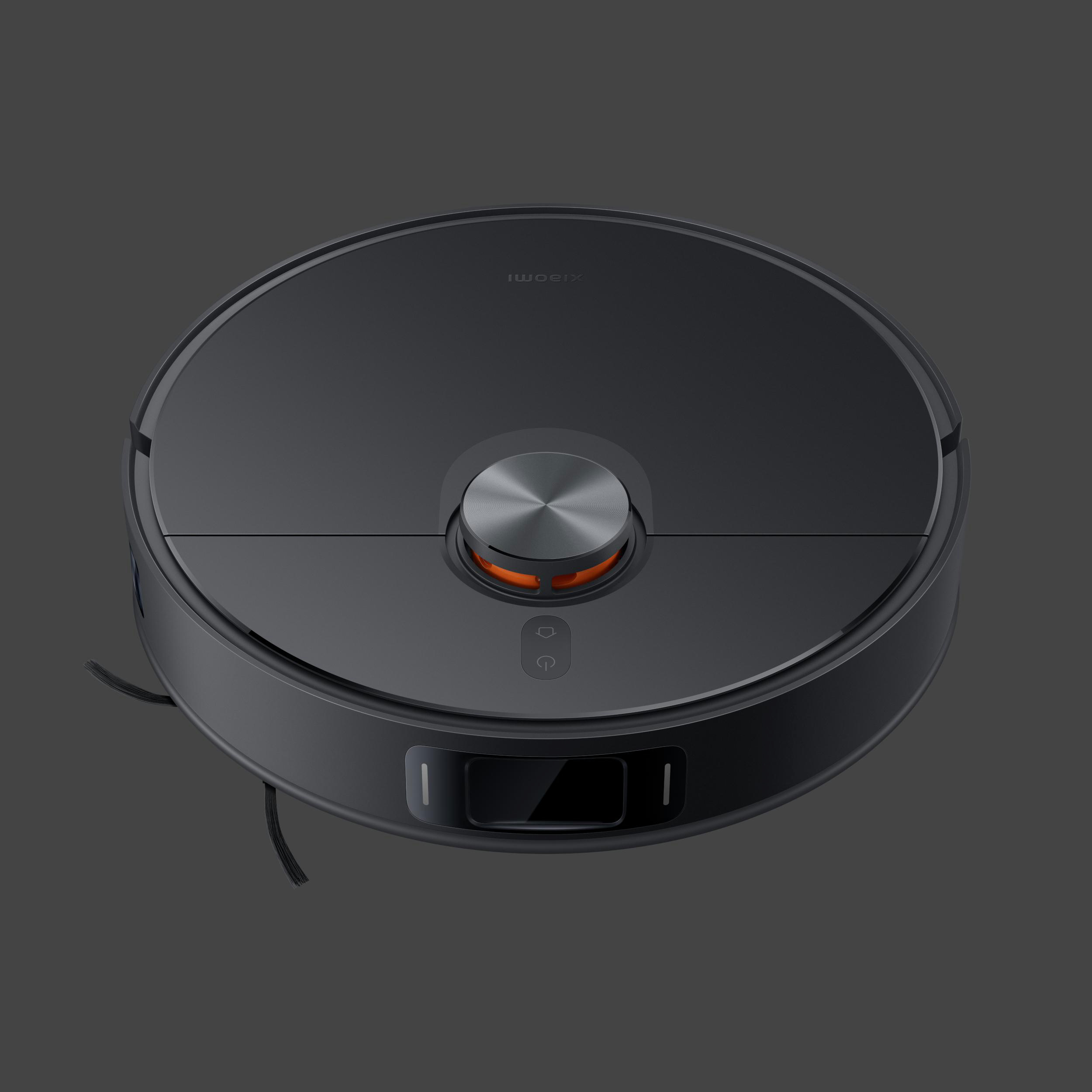 Ein dunkelgrauer Roboter-Staubsauger. Er hat einen schwarzen Körper mit silberner Mitte und Knöpfen, auf grauem Hintergrund.