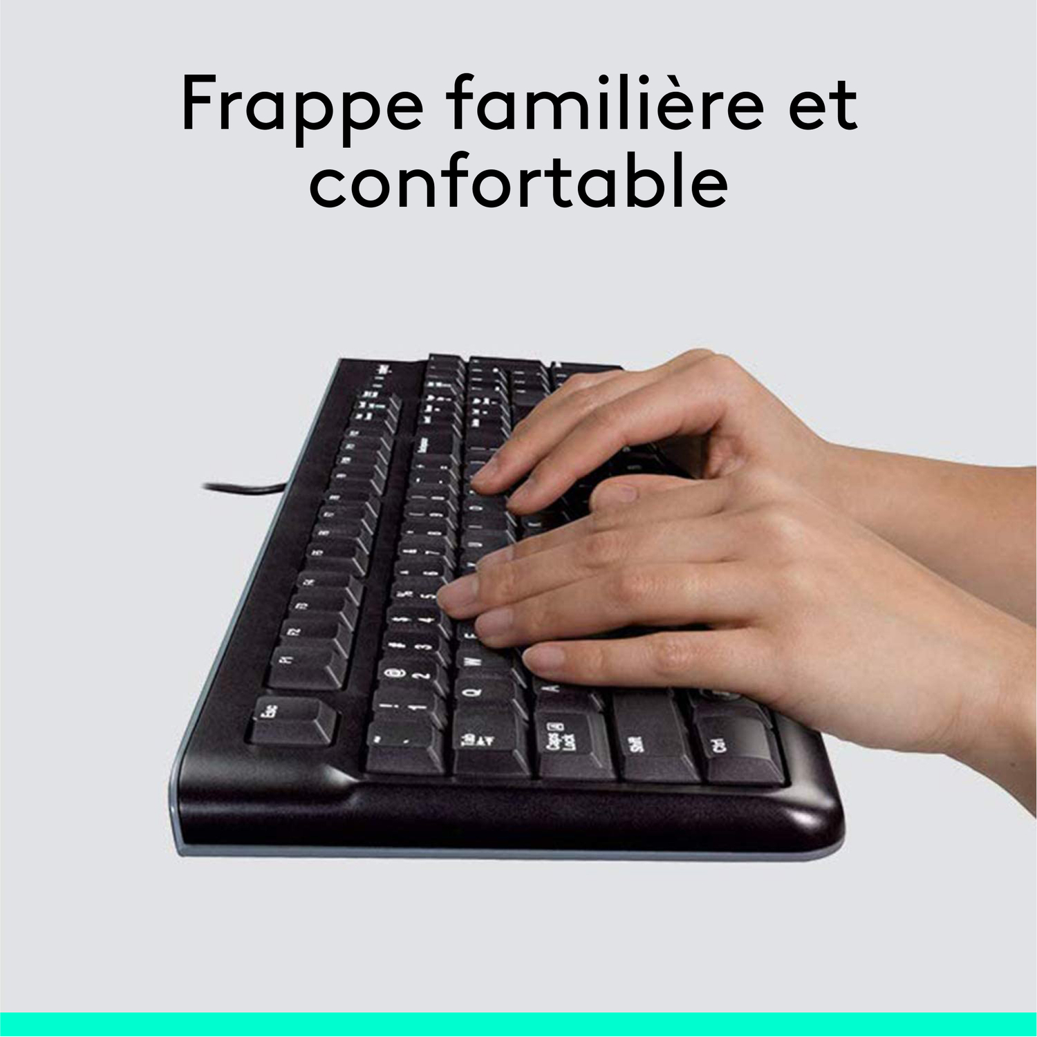 Mains tapant sur un clavier noir, bulle de texte.