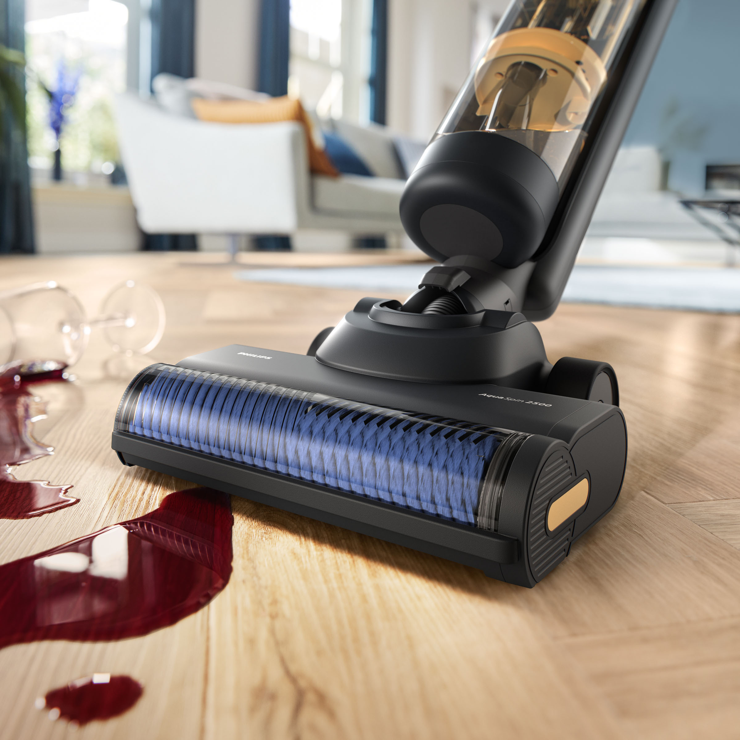 Odkurzacz czyszczący rozlany czerwone wino na drewnianej podłodze.