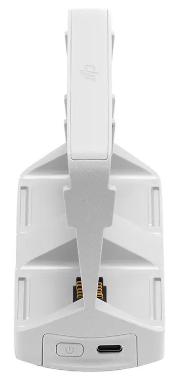 Biała stacja ładująca drony z przyciskiem zasilania i portem USB.