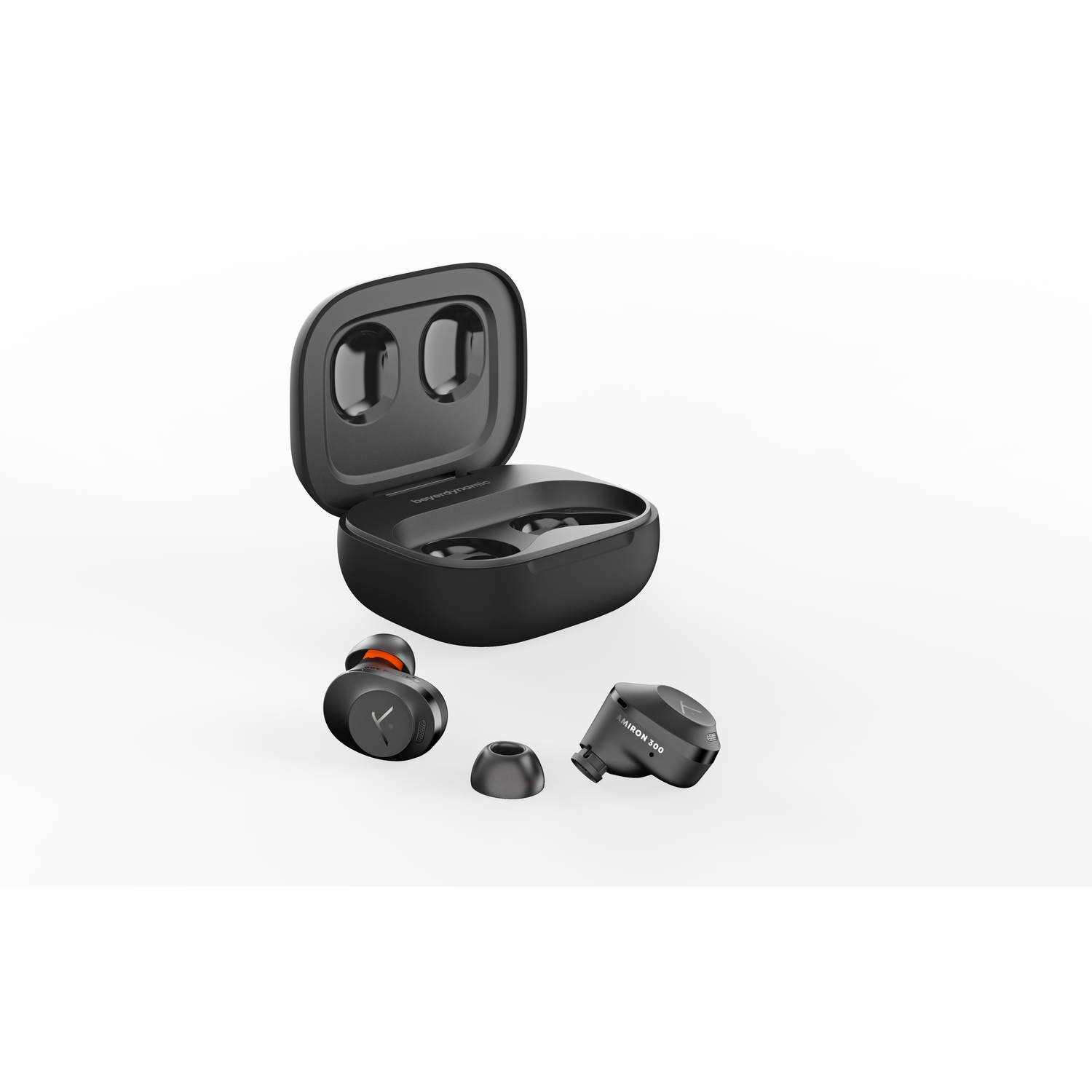 A black earbud case with two earbuds and tips.
