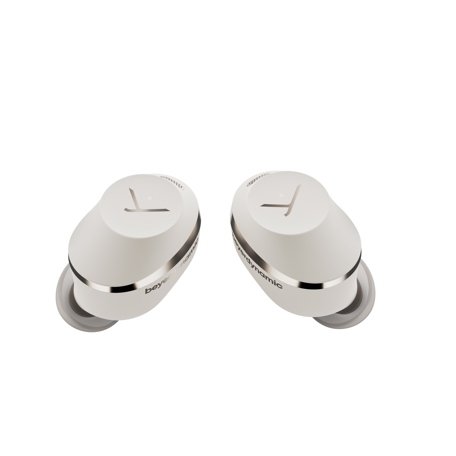 White earbuds. Silver accents. Beyerdynamic branding. Top-down view.