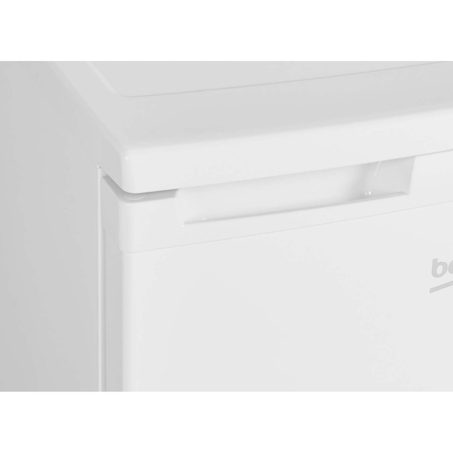 Close-up of a white freezer door handle and a part of the freezer.