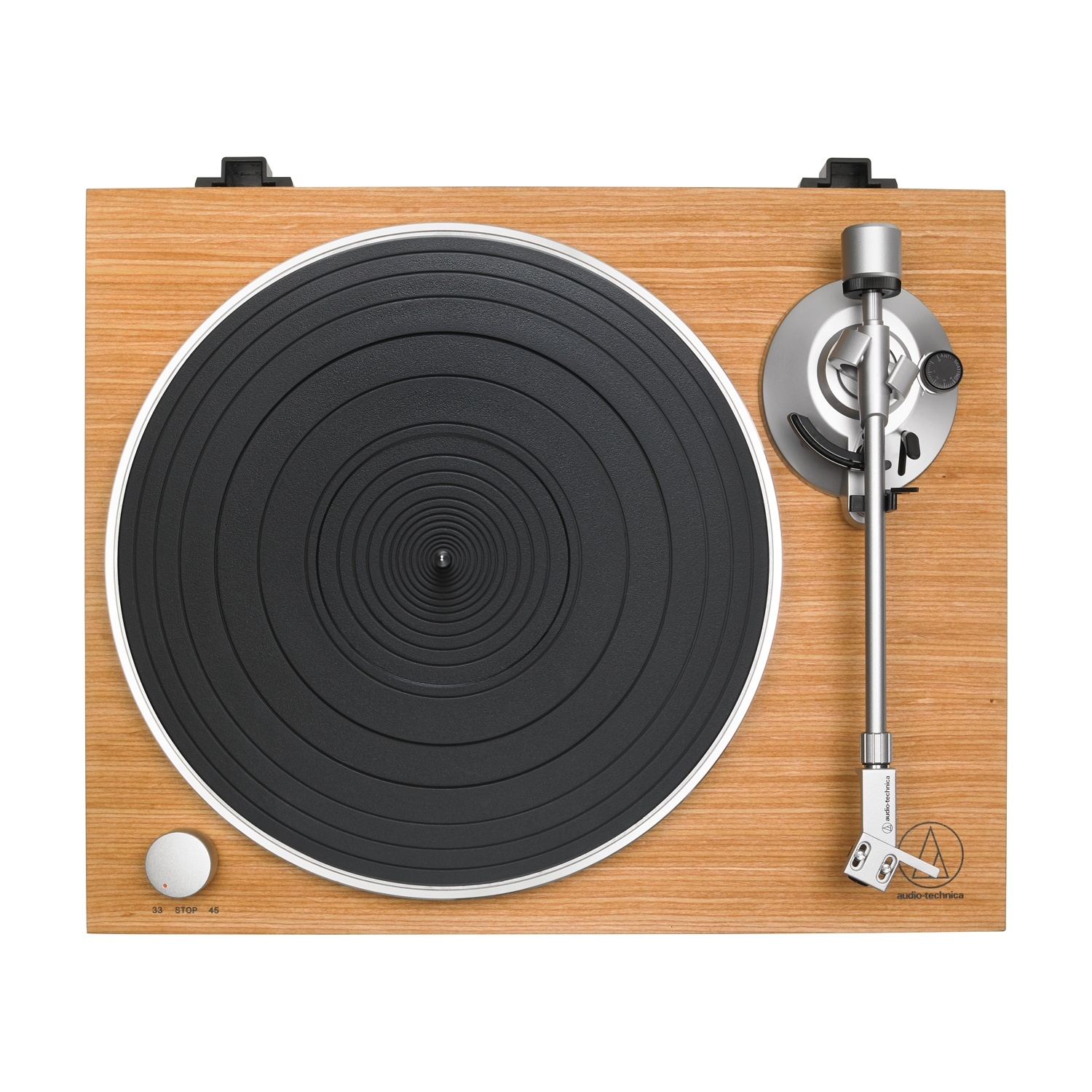 Vista dall'alto di un giradischi Audio-Technica in legno con un disco in vinile nero.