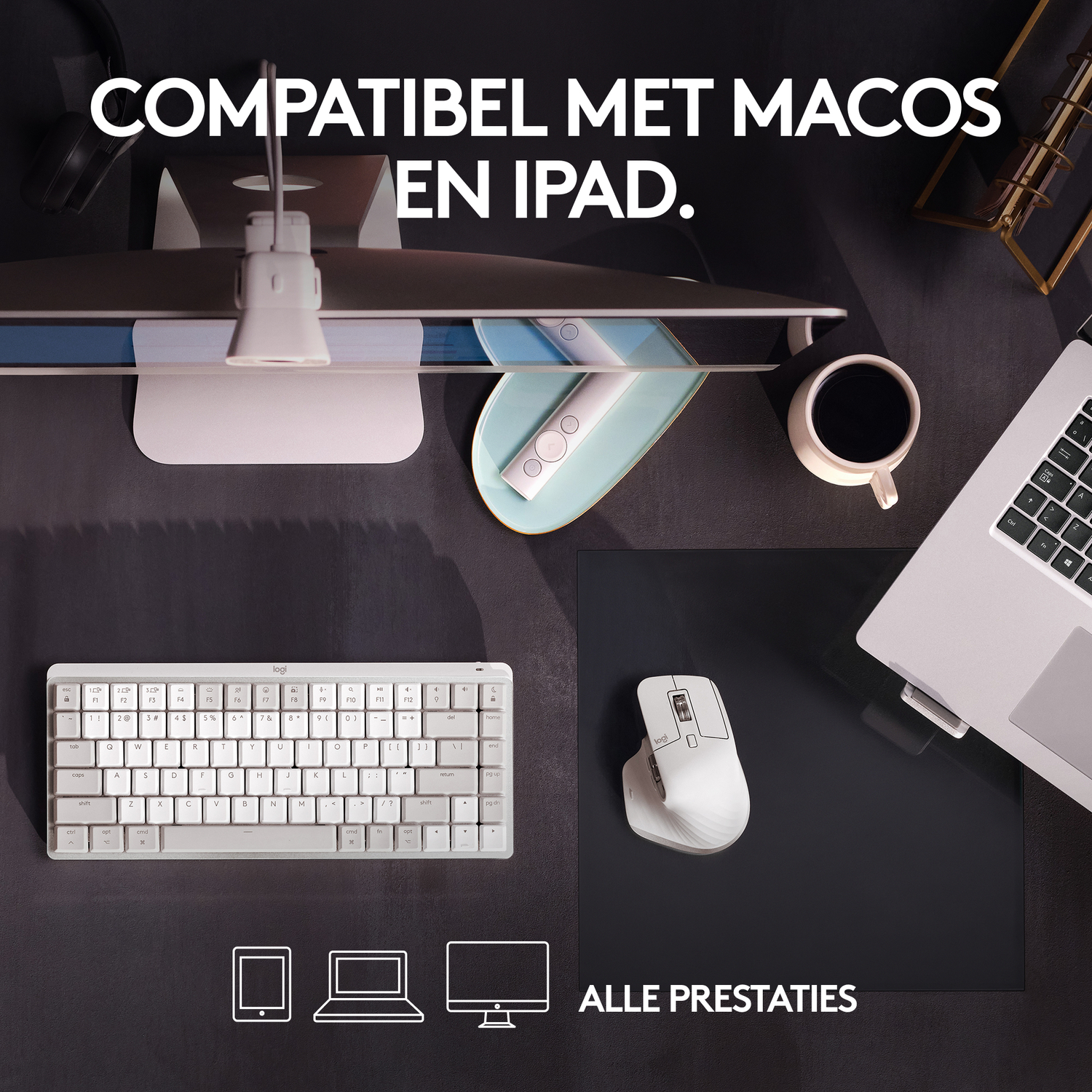 Desk setup with keyboard, mouse, laptop and monitor, with text 'COMPATIBEL MET MACOS EN IPAD'.