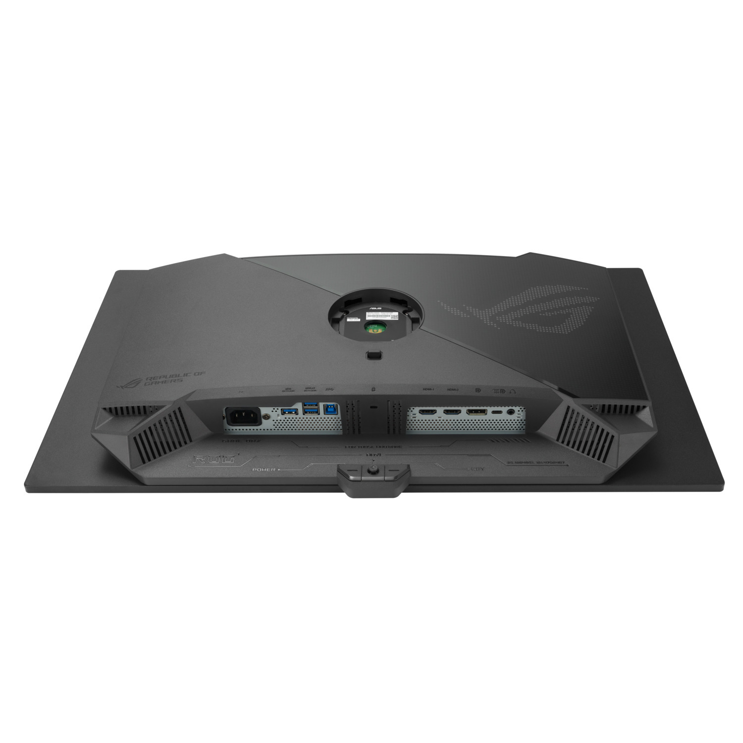 Back of a black monitor with ports and a stand.