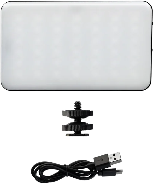 Une petite lumière avec un support et un câble USB sur fond noir.