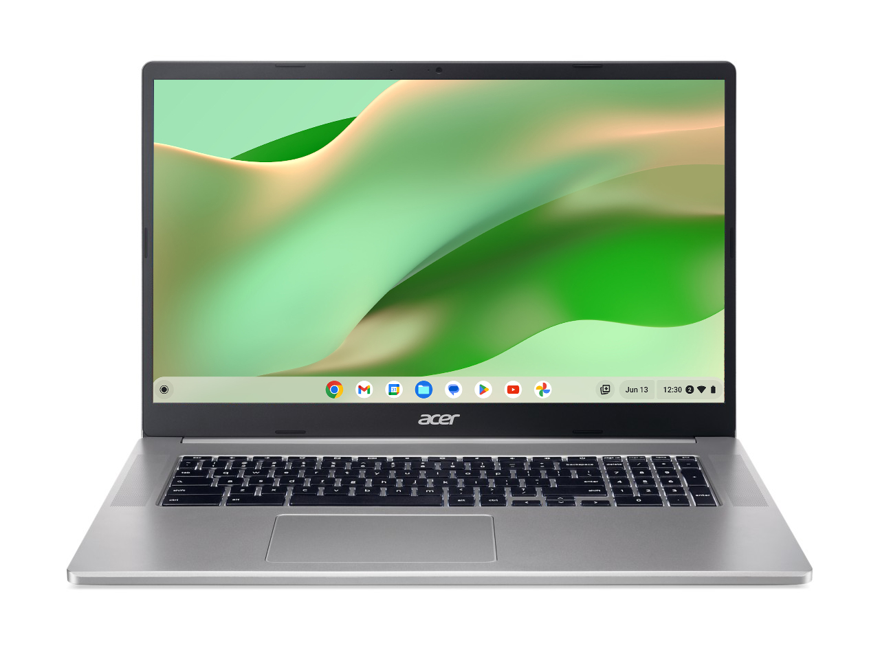 Silberner Laptop mit großem Bildschirm, der einen grün-weißen abstrakten Hintergrund zeigt.