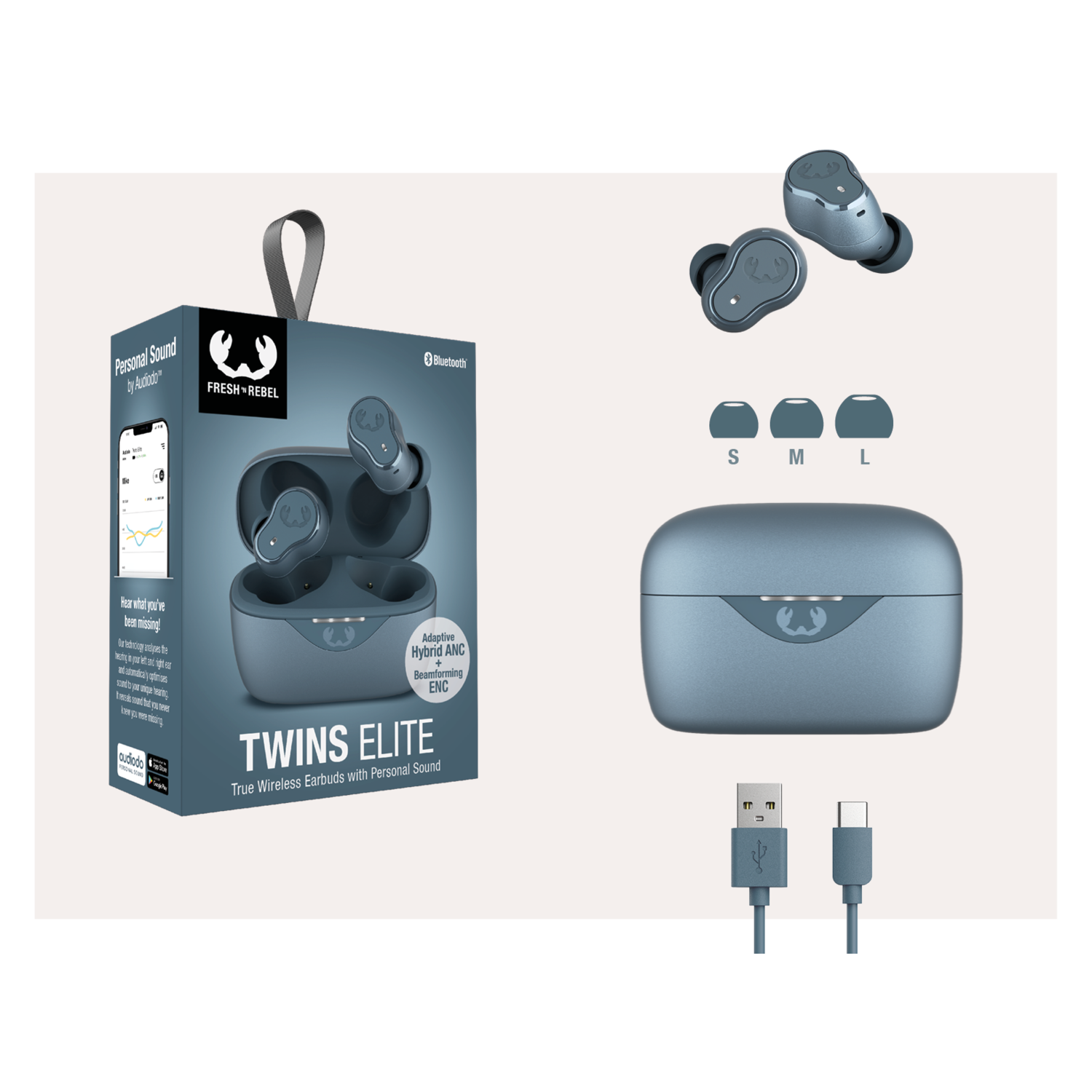 Earbuds in a box with accessories. The box is open. There are extra ear tips and a charging cable.