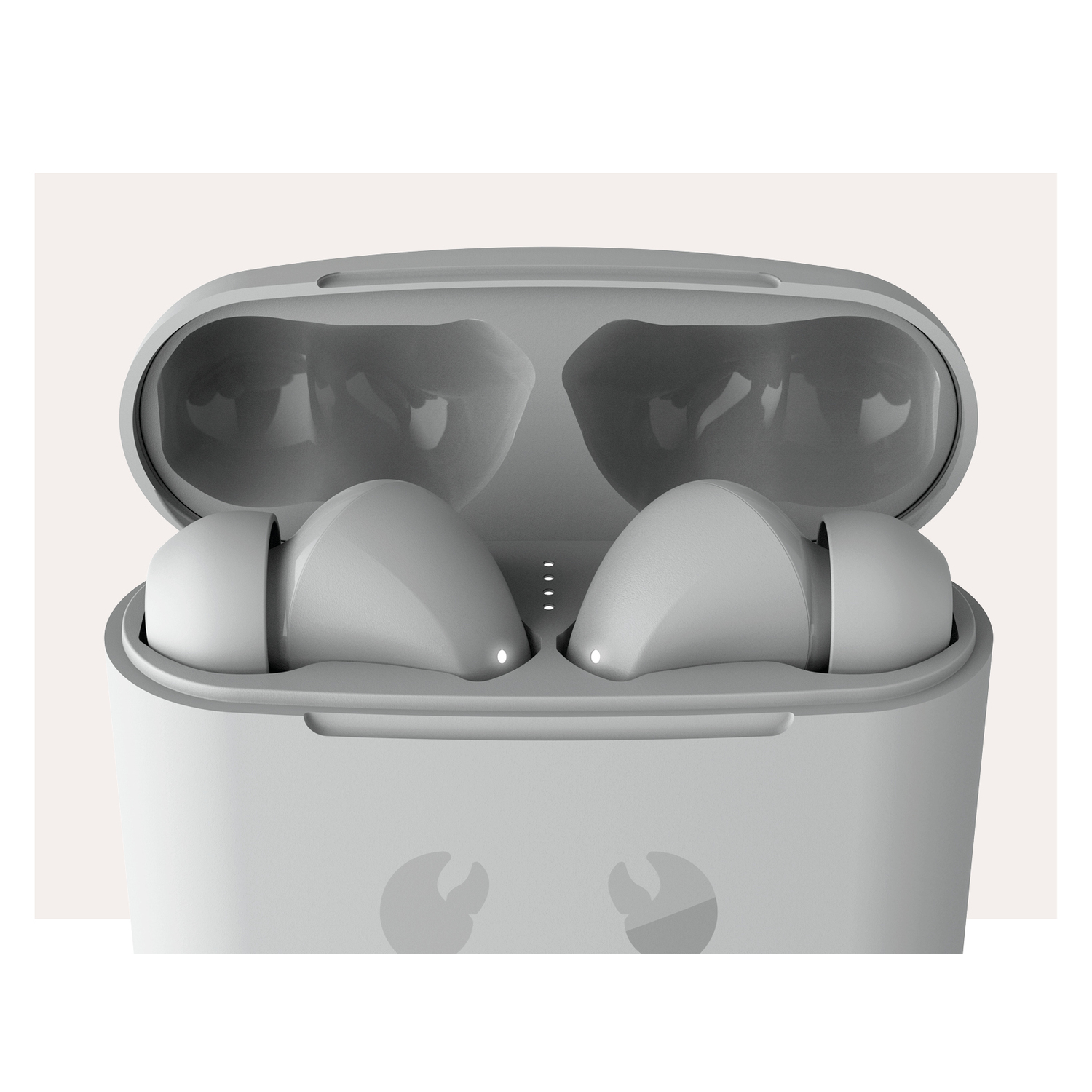 Gray earbuds inside an open gray charging case, close-up shot.