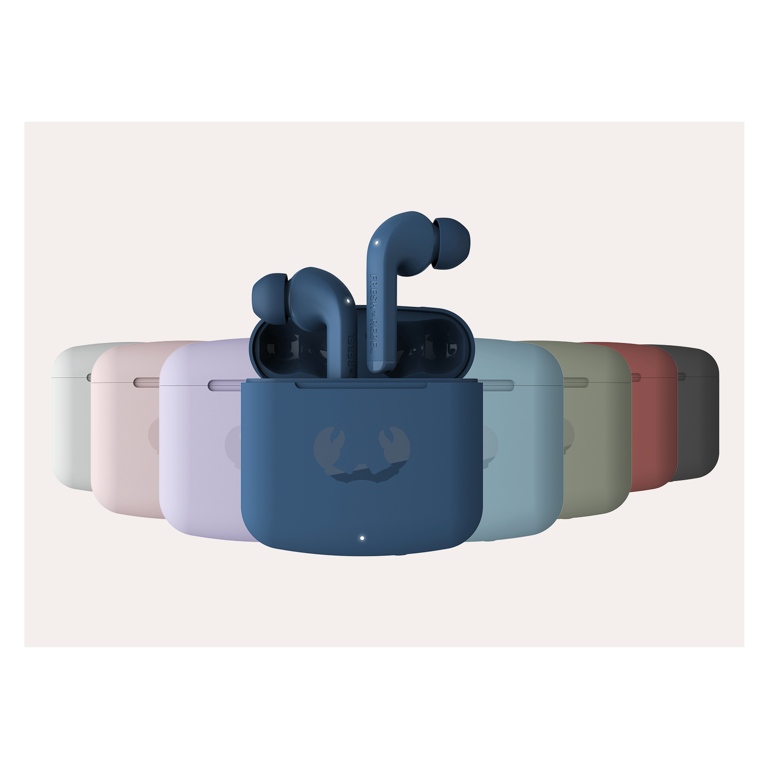 A group of earbuds in different colored cases, one case open.