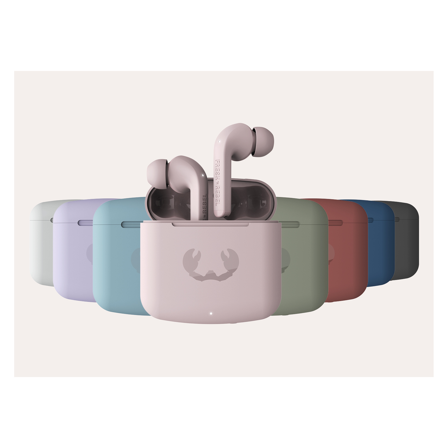 Earbuds and charging cases in a row, different colors, with charging case open.