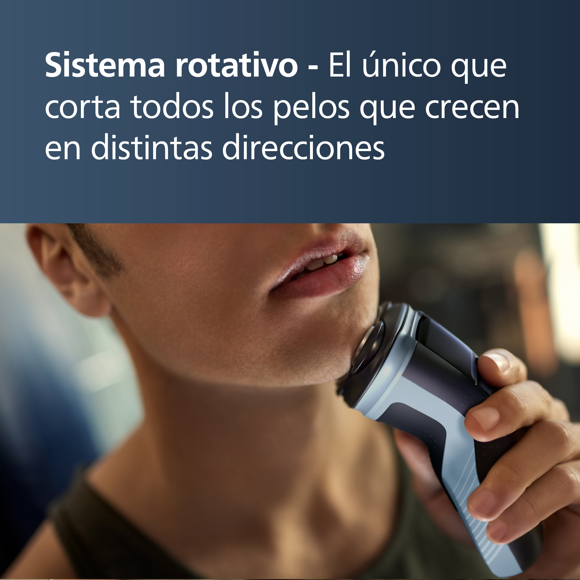 Un hombre se afeita la cara con una afeitadora eléctrica azul y negra.