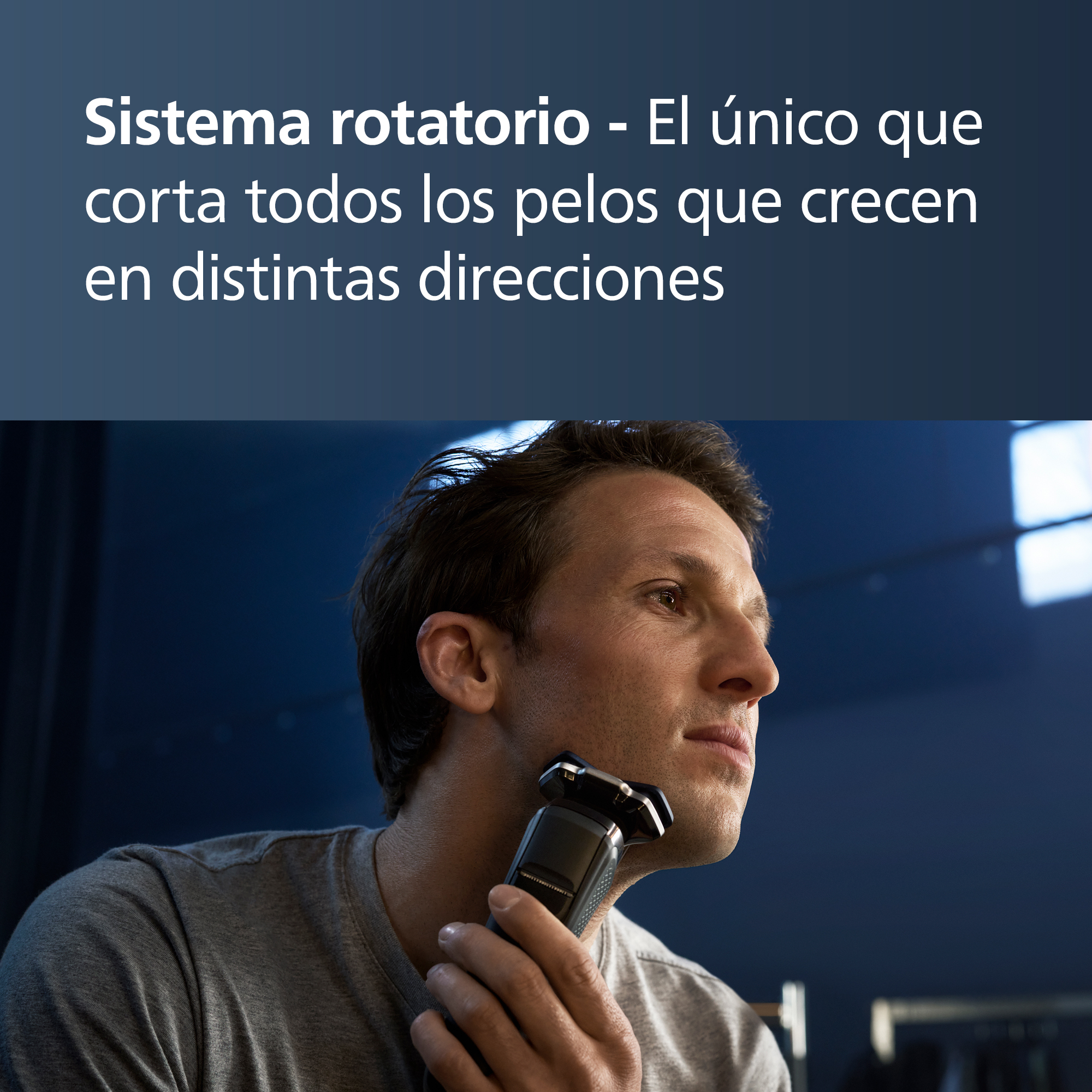 Un hombre afeitándose con una afeitadora eléctrica, mostrando el dispositivo y su rostro.