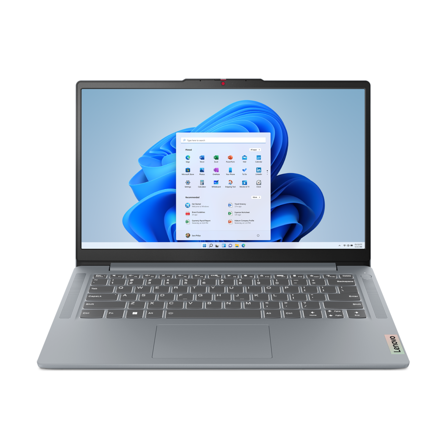 Un ordinateur portable Lenovo argenté, ouvert, affichant un bureau Windows 11 avec un fond noir.