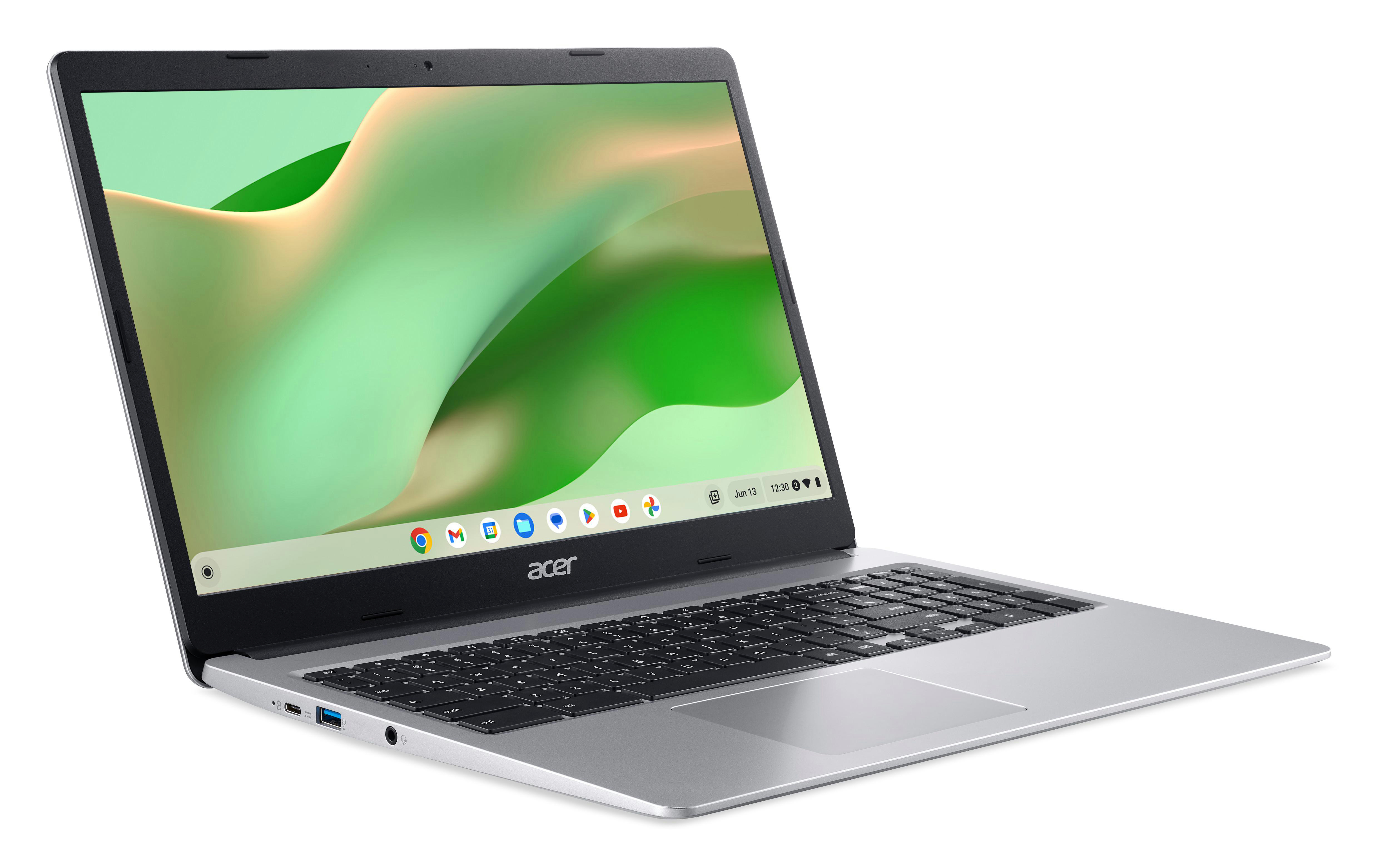 Silberner Laptop auf weißem Hintergrund. Bildschirm zeigt Chrome OS Oberfläche. Geöffnet, leicht angewinkelt.