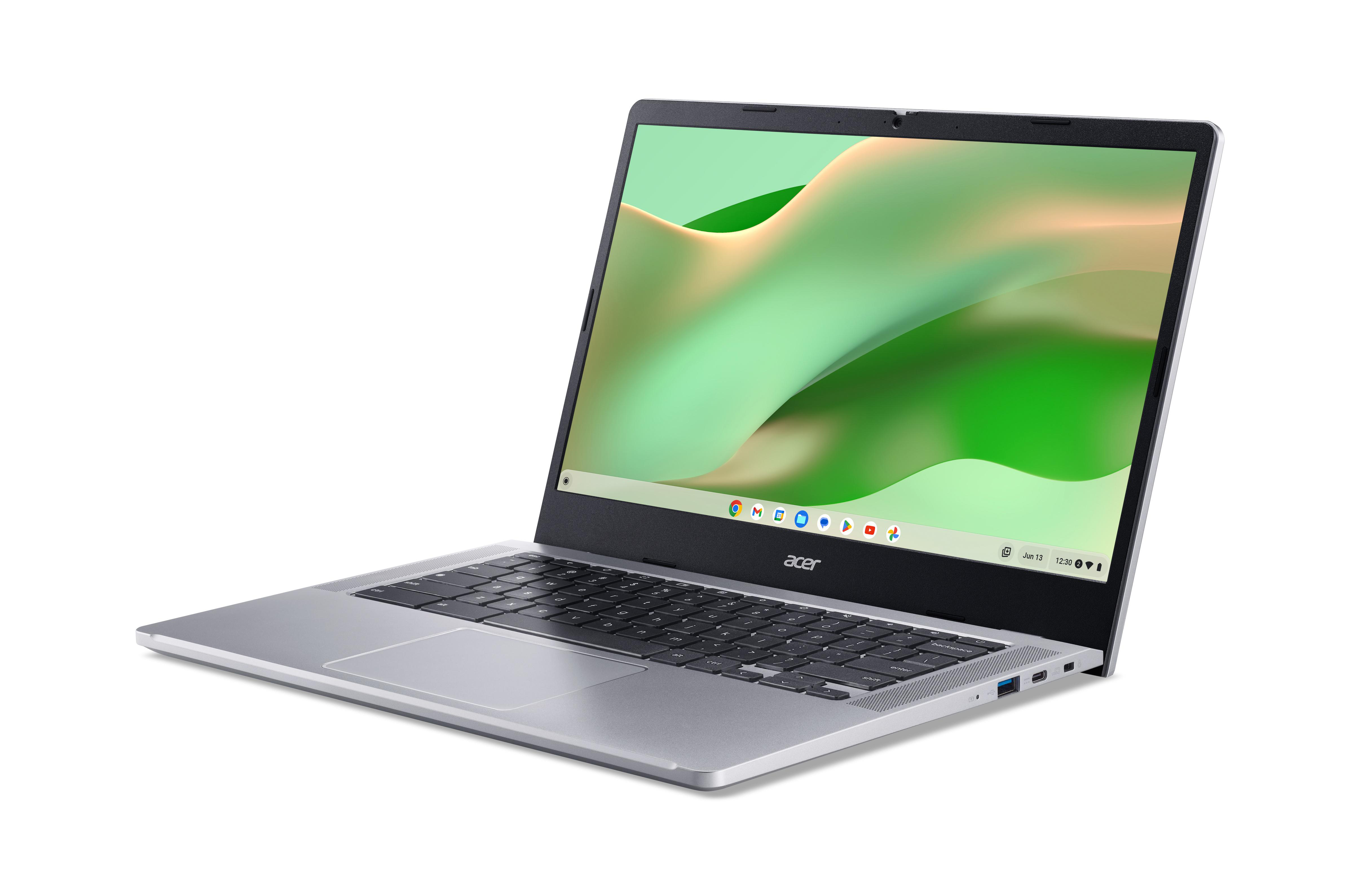 Silberner Laptop auf weißem Hintergrund, geöffnet, Bildschirm zeigt einen grün-weißen Farbverlauf.