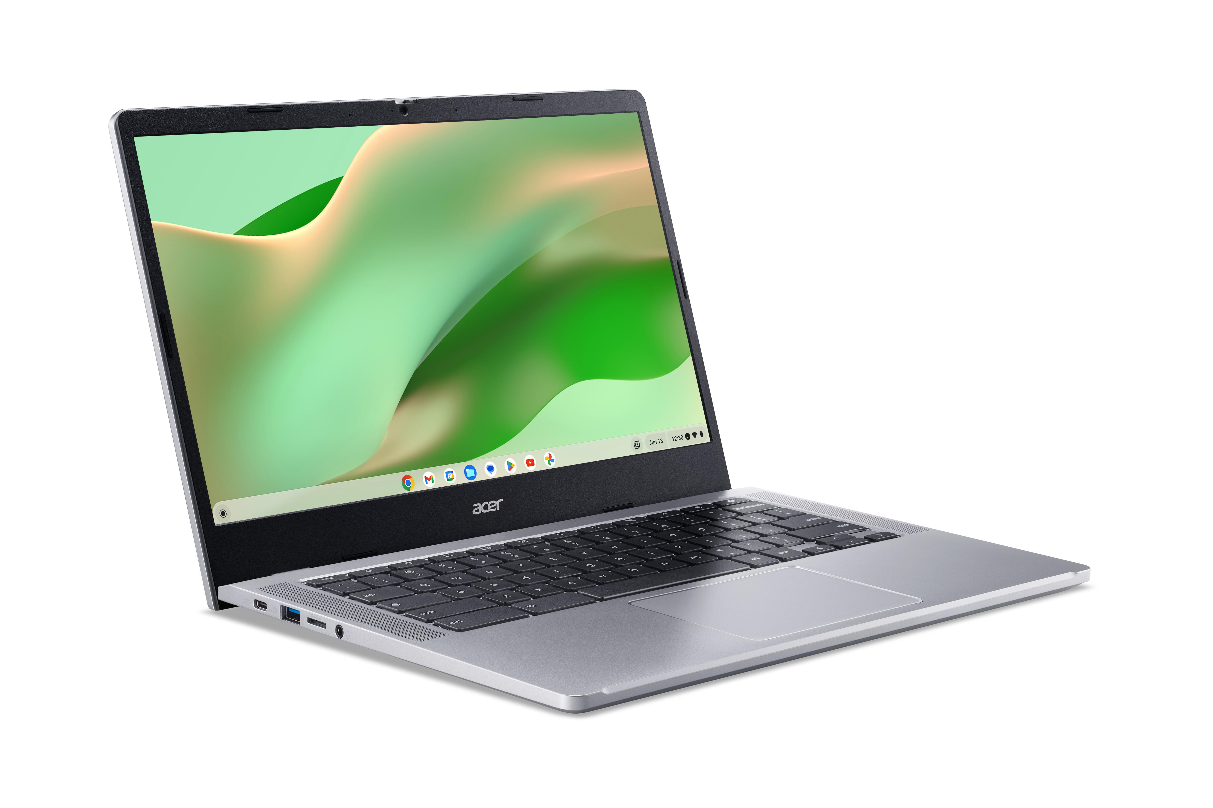 Silberner Laptop auf weißem Hintergrund.