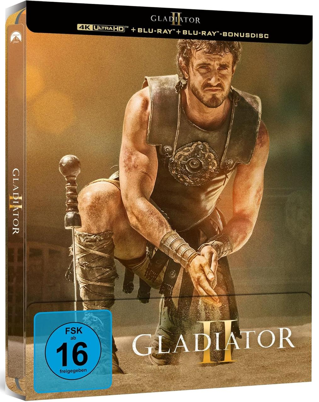 Gladiator II Filmcover mit einem Mann in Rüstung, Filmtitel und Altersfreigabe auf der Hülle.