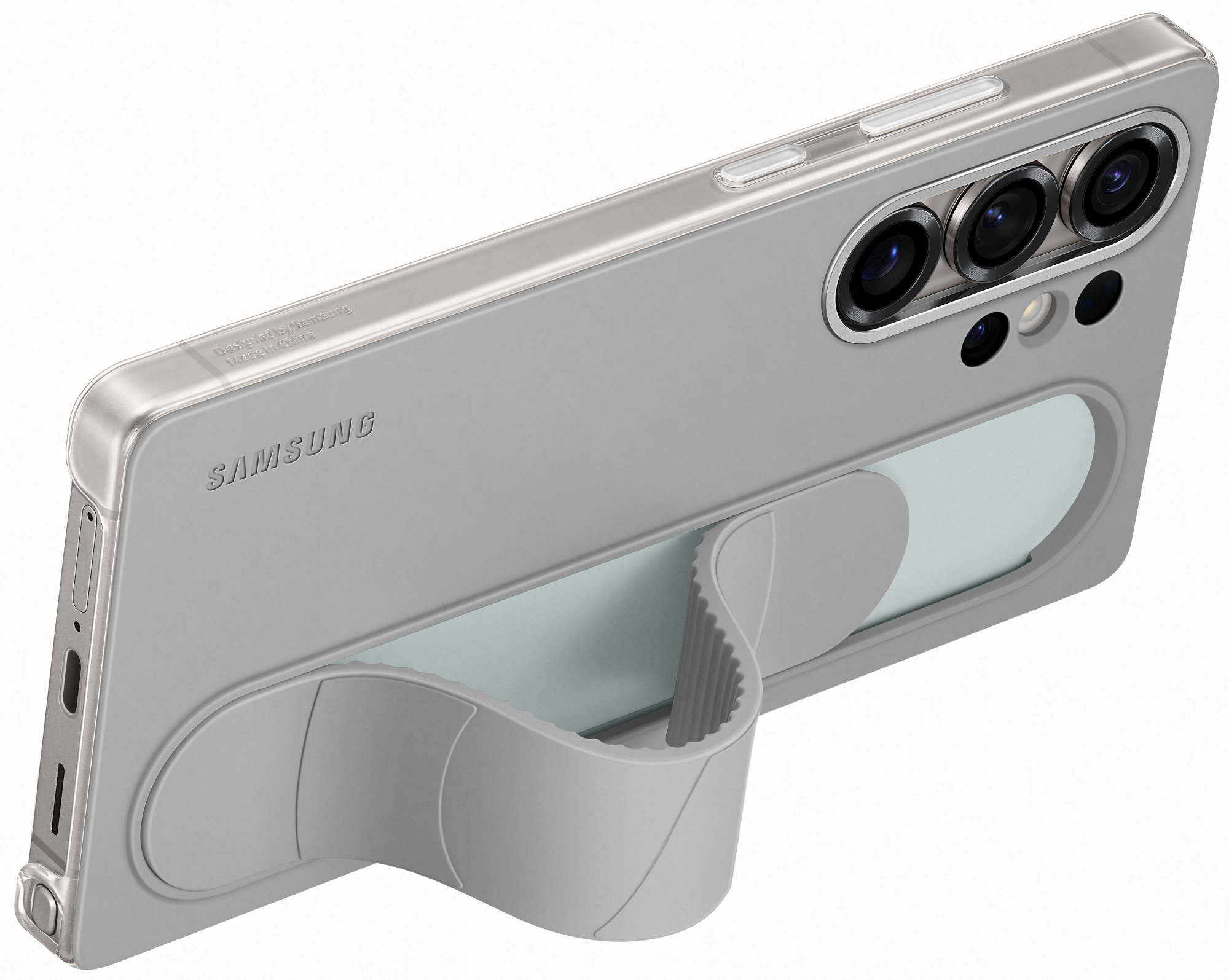 Világosszürke telefontok beépített állvánnyal, a Samsung logójával és a telefon kameramoduljával.