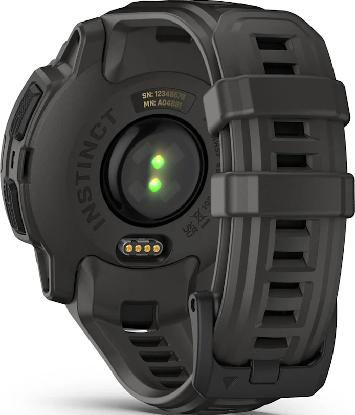 Montre intelligente noire avec bracelet noir et lumières vertes sur fond sombre.