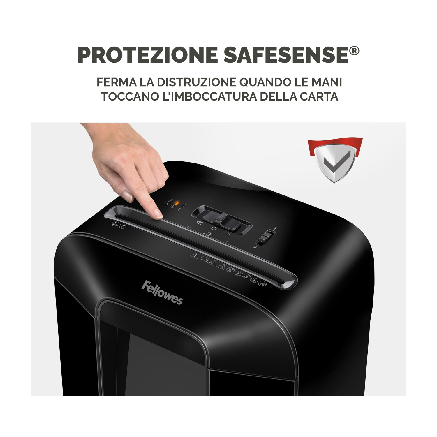 Dito di donna su un distruggidocumenti. Dispositivo nero con logo Fellowes.