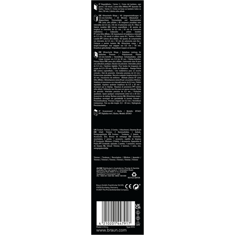 Embalaje con texto multilingüe sobre un recortador. Fondo blanco.