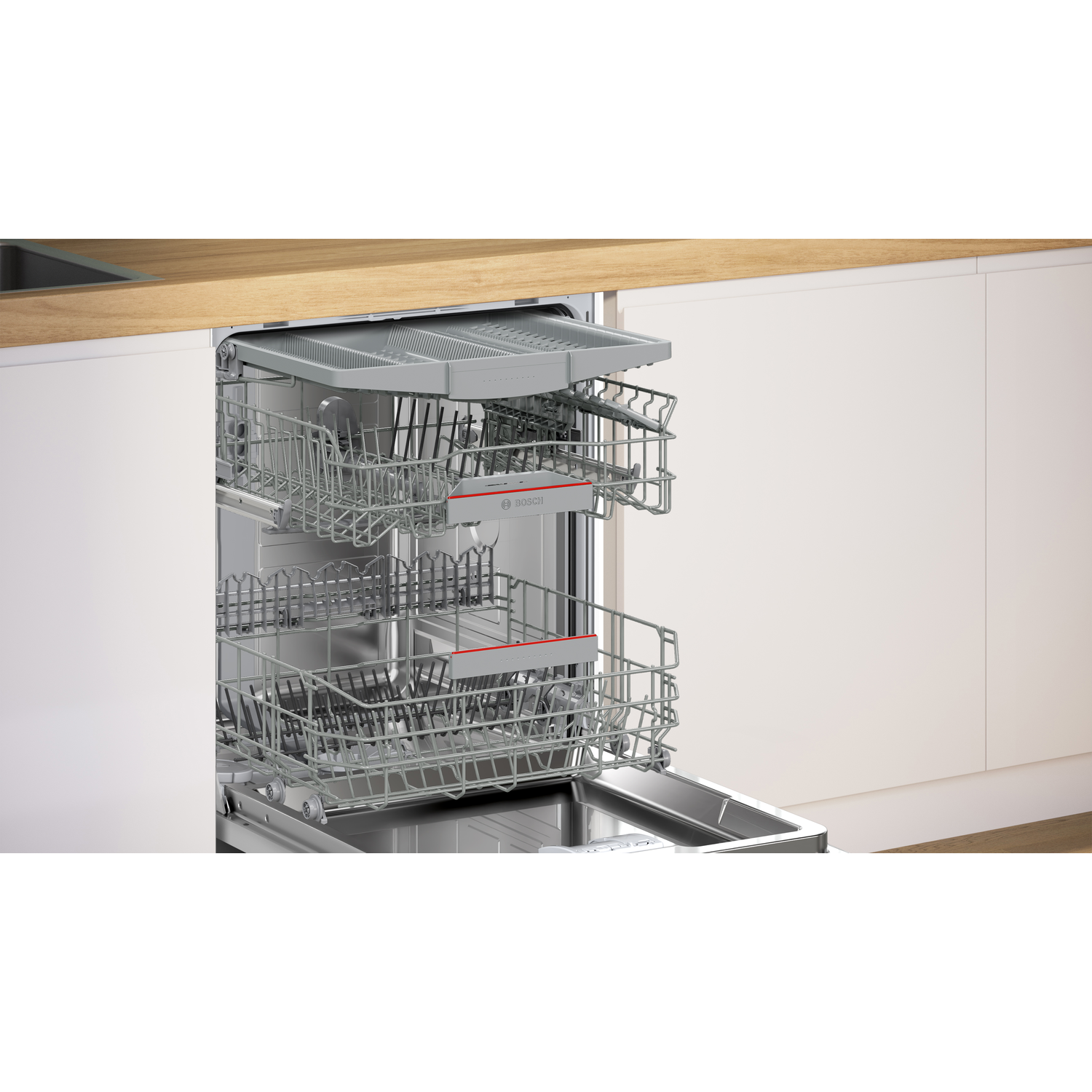 Vaatwasserinterieur met rekken, de binnenkant van het apparaat tonend.