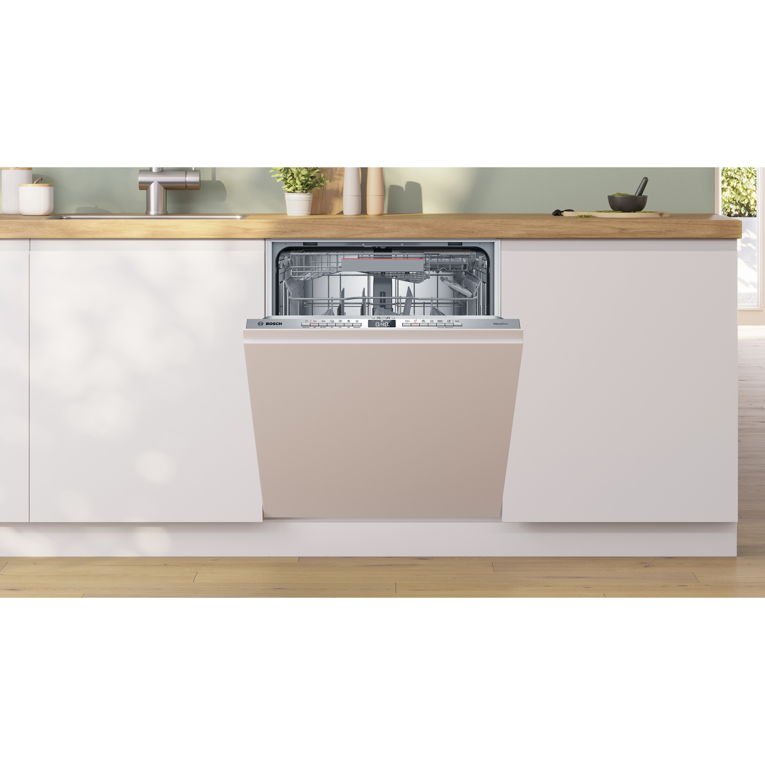 Vaatwasser met lichtbruine deur geïnstalleerd in een keuken.