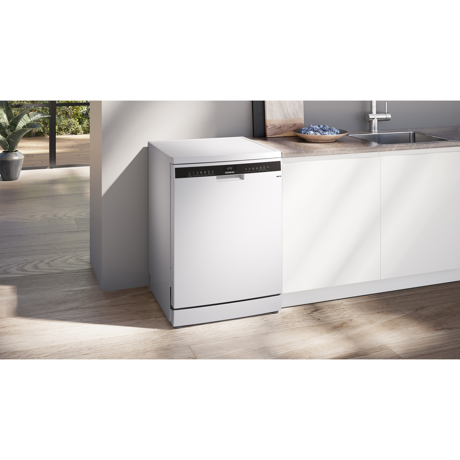 White built-in dishwasher in a modern kitchen setting.