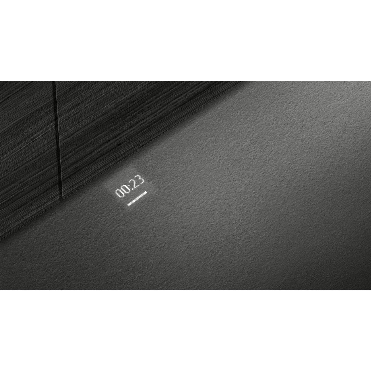 A dark surface with a digital display showing 00:23 and a line.
