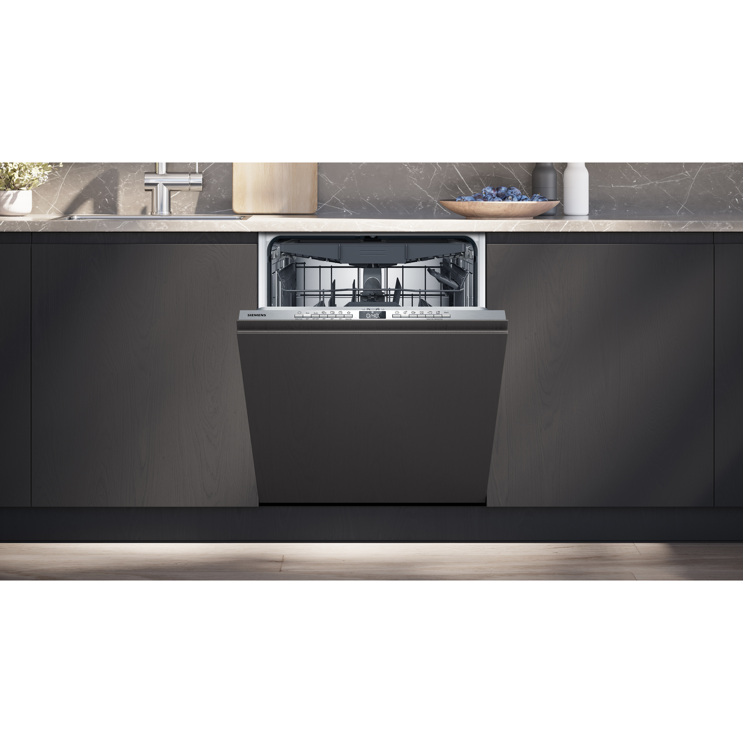 Black dishwasher with open door, in a modern kitchen. Dark cabinets and countertop, stainless steel sink.
