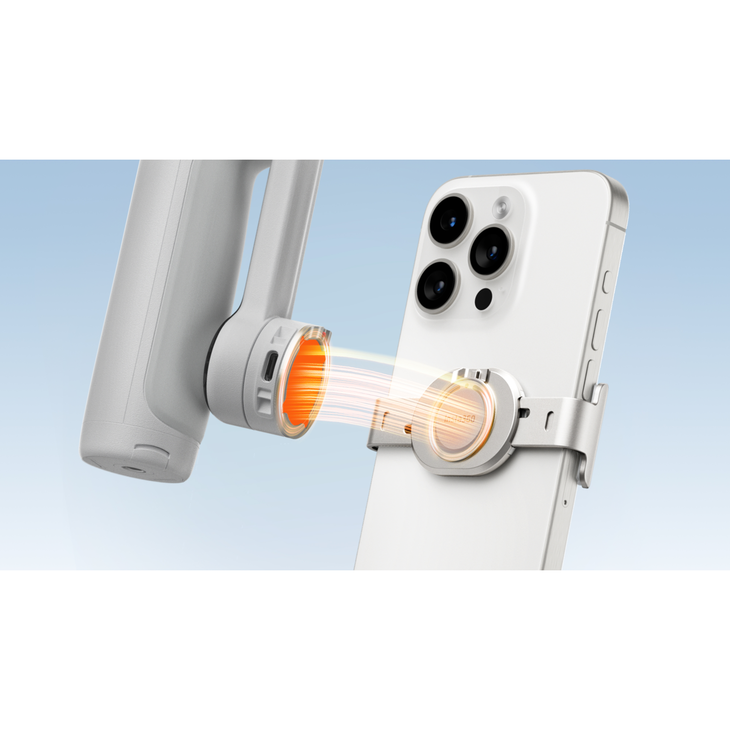 White phone with a magnetic holder and an orange-glowing connecting device.
