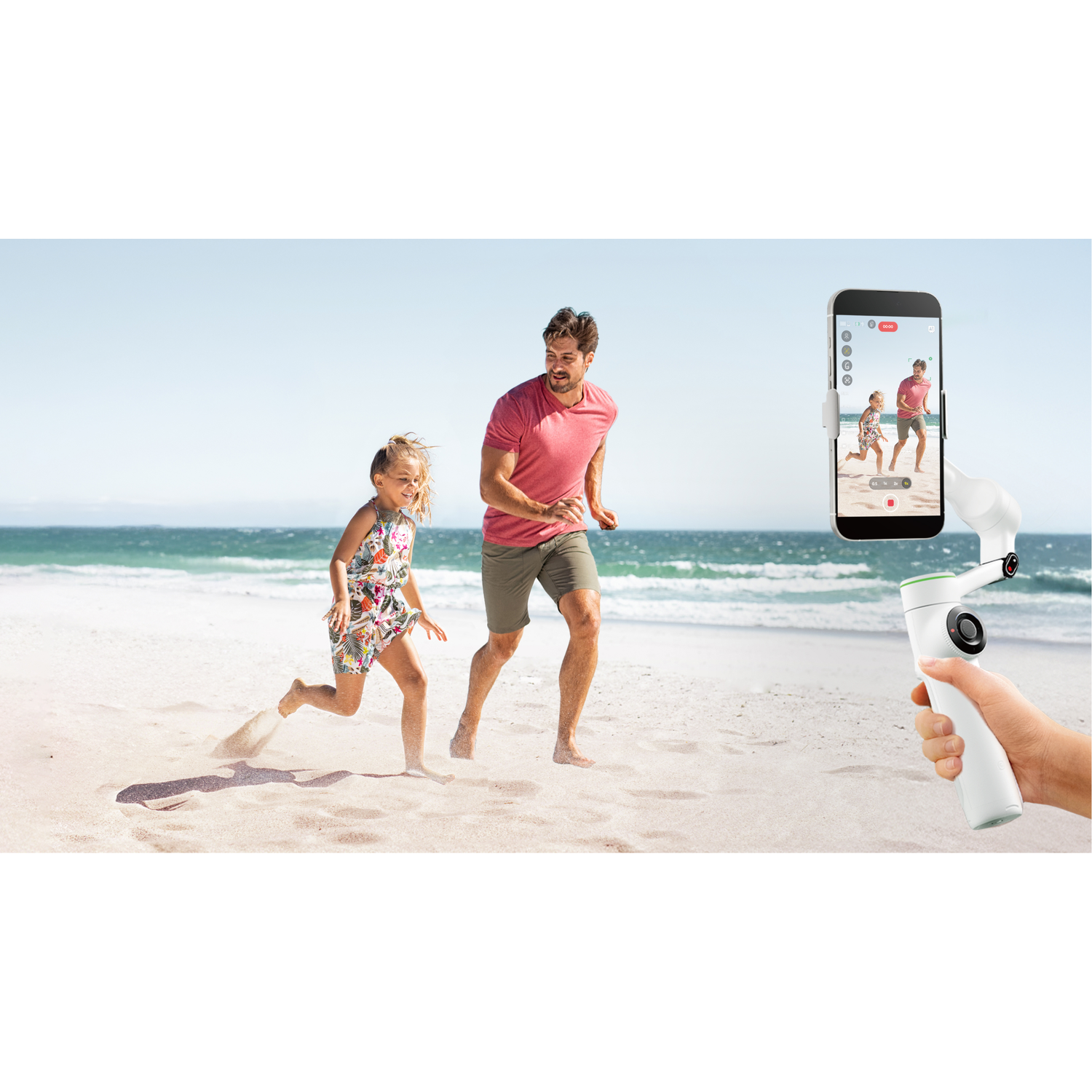 Father and daughter running on the beach, a phone shows live video.