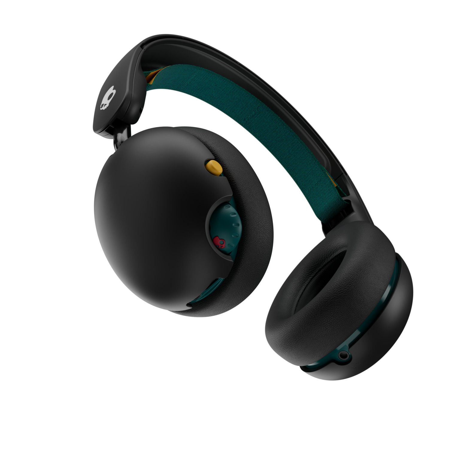 Black headphones with teal accents, yellow dial, and skull logo. White background.