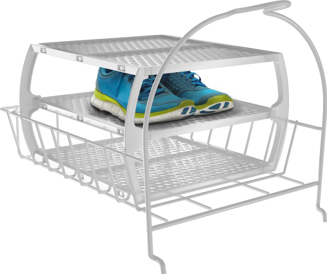 Estante blanco para secar zapatos con un par de zapatos azules.