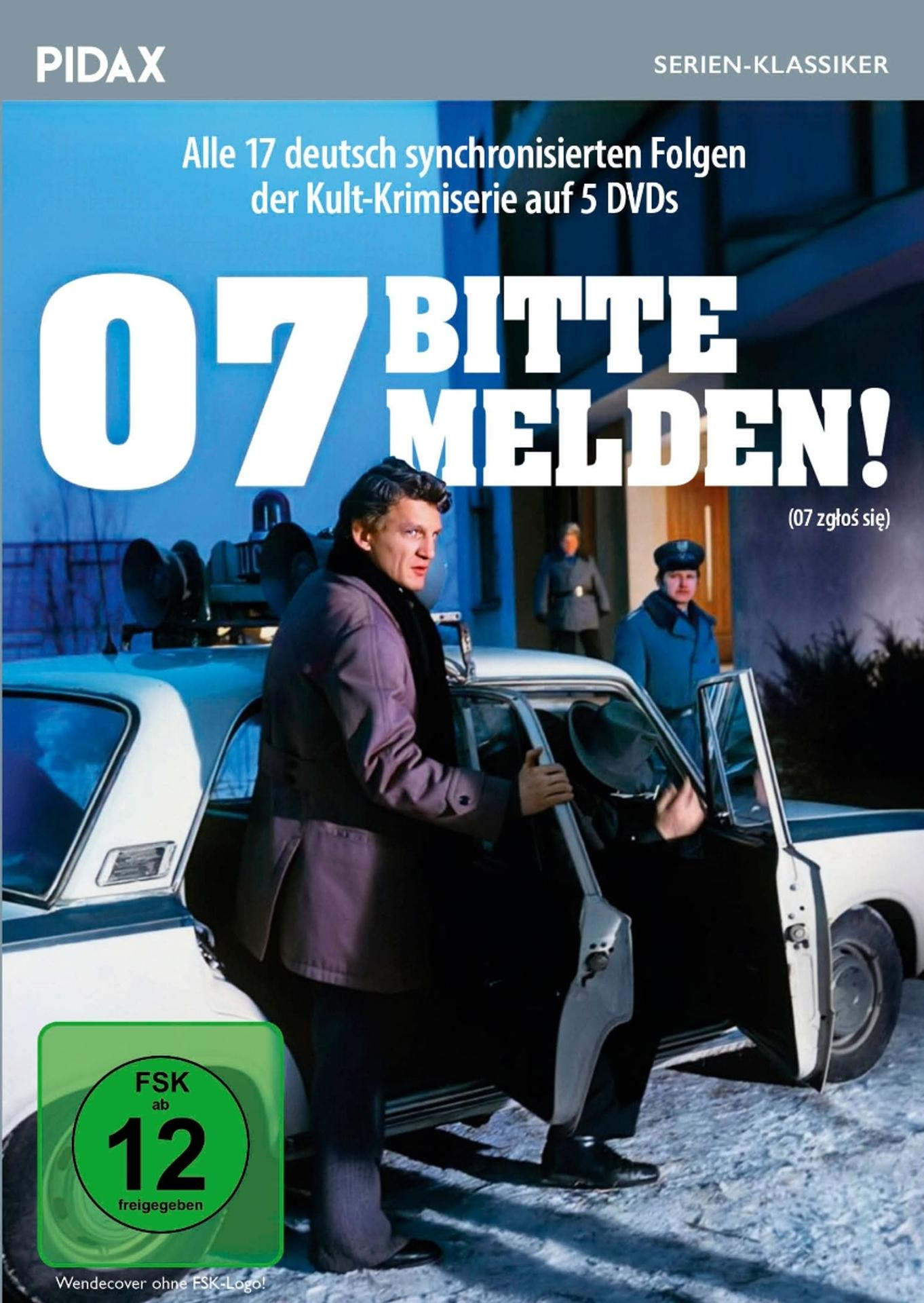 DVD-Cover: 07 Bitte Melden! Zwei Polizisten und ein Mann in einem lila Mantel an einem Auto.