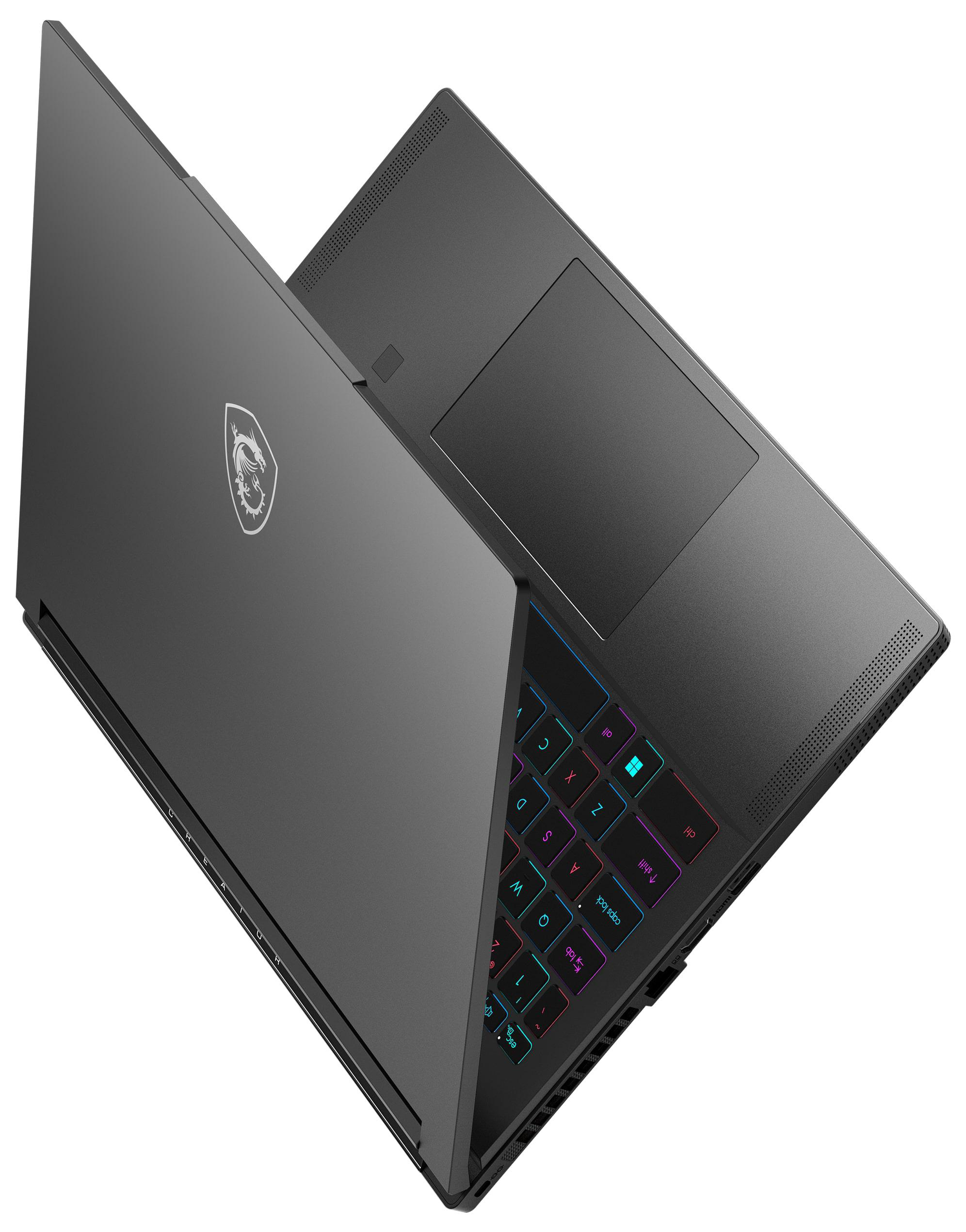 Ein silberner Laptop mit geöffnetem Bildschirm, der ein farbenfrohes abstraktes Bild zeigt.
