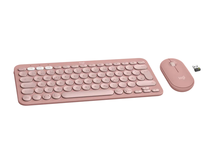 Pinke Tastatur, Maus und USB-Empfänger auf schwarzem Hintergrund.