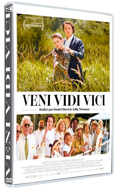 Jaquette DVD de 'Veni Vidi Vici'. Montre un couple dans un champ et un groupe de personnes en arrière-plan.