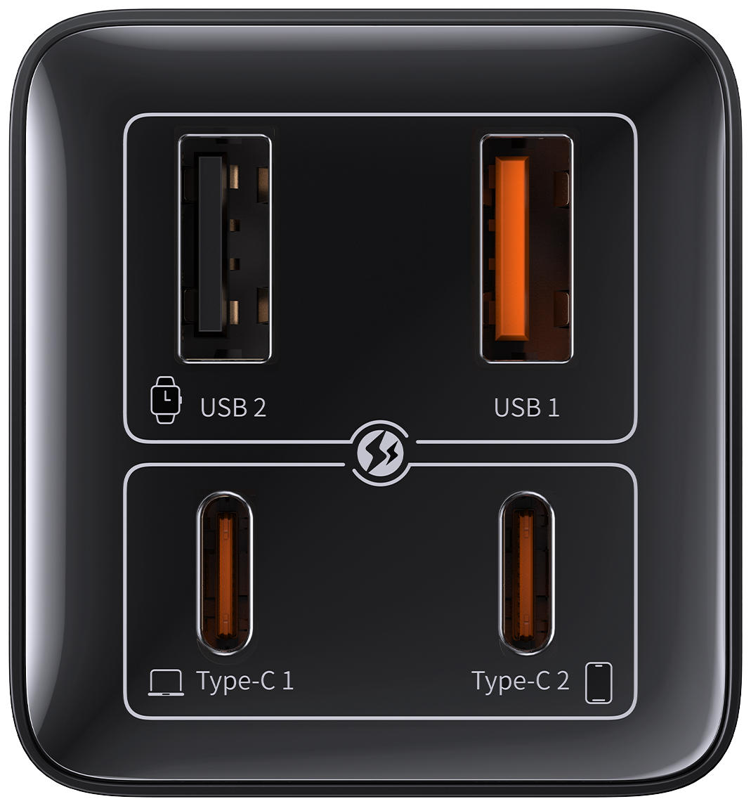 Fekete töltőadapter közeli képe USB és C típusú portokkal. Az adapter fényes.