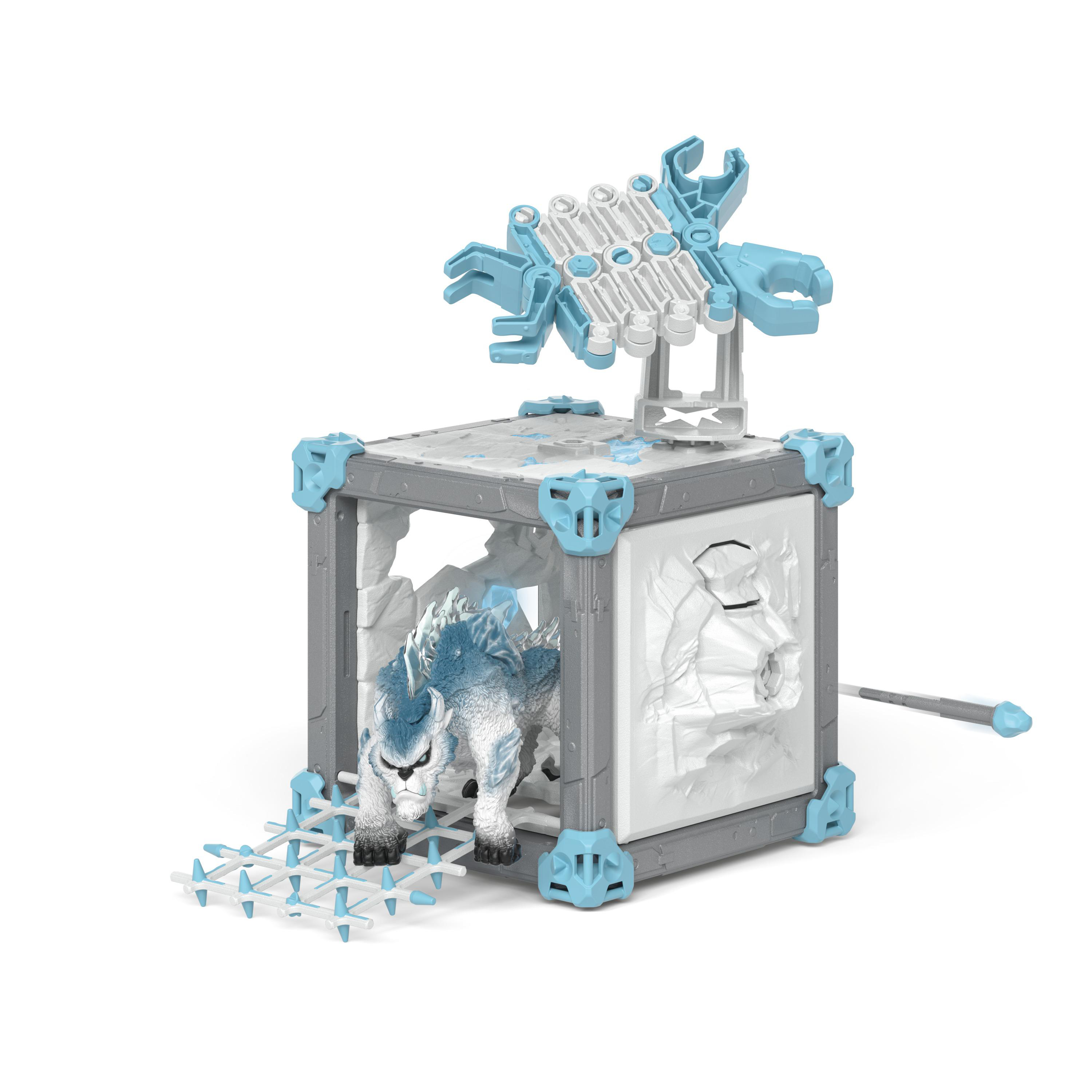 Ein Spielzeugtier in einem grau-blauen Würfelbau. Die Oberseite hat ein blaues Design.