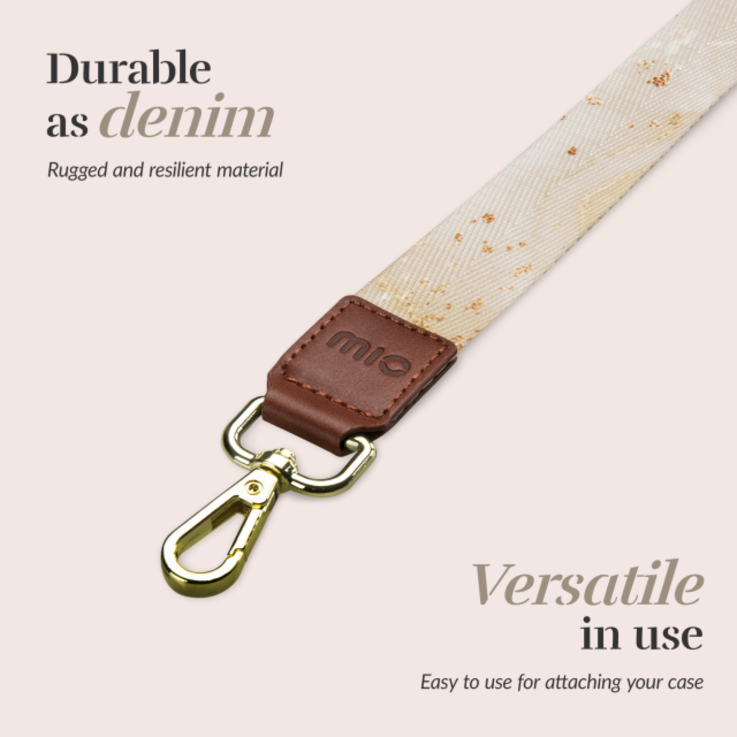 A lanyard with text and a metal clasp. Brown leather patch with 'mie' on it.
