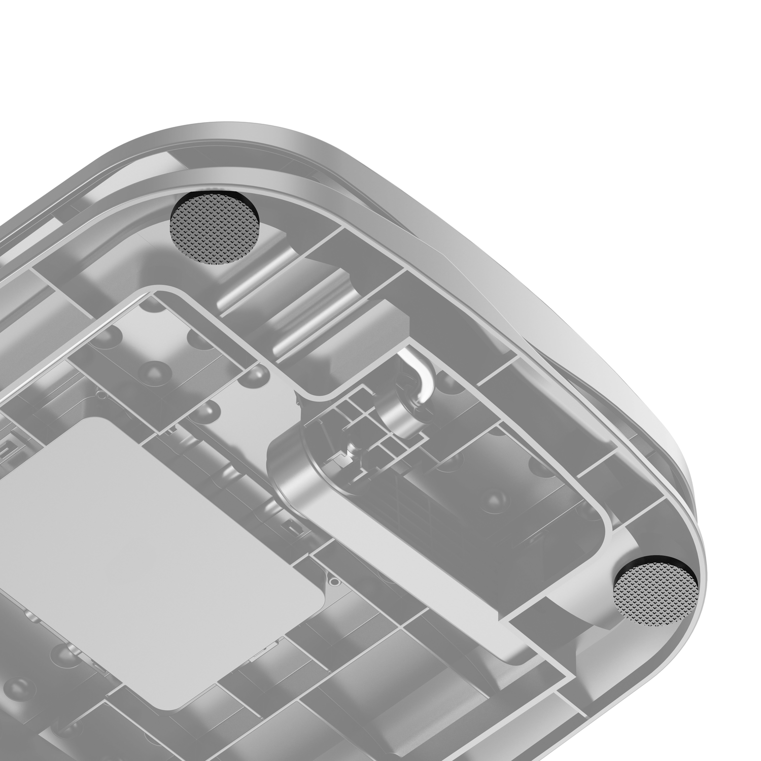 Close-up of the bottom of an electronic device. Visible are two rubber feet.