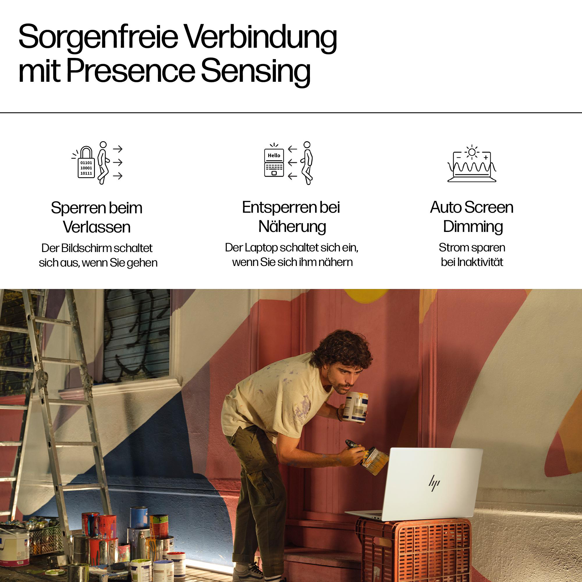 Ein Mann malt mit offenem Laptop. Text über Sicherheit.